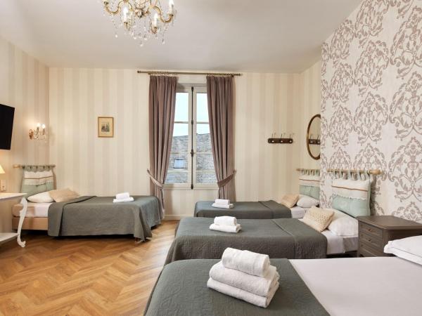 Hôtel De France Et De Guise - 1891 : photo 1 de la chambre chambre familiale