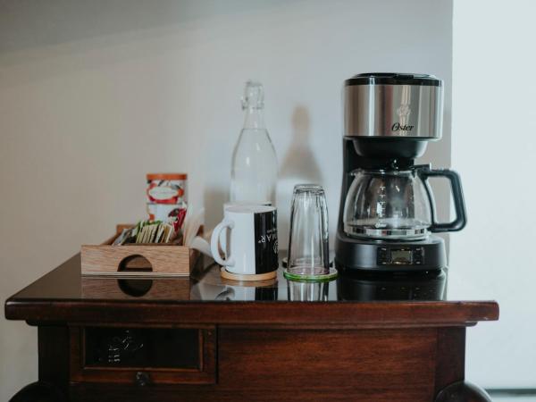 LARIMAR Gallery y Hotel Boutique : photo 1 de la chambre chambre lit king-size supérieure