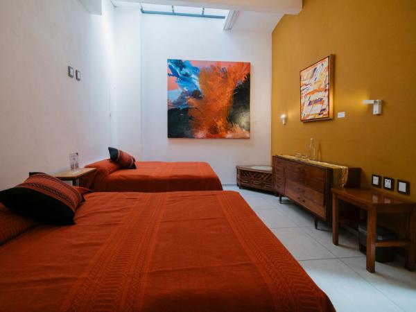 LARIMAR Gallery y Hotel Boutique : photo 3 de la chambre chambre double standard