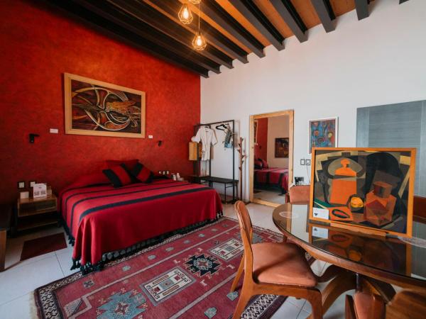 LARIMAR Gallery y Hotel Boutique : photo 5 de la chambre chambre lit king-size supérieure