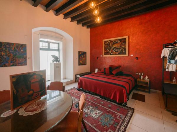 LARIMAR Gallery y Hotel Boutique : photo 7 de la chambre chambre lit king-size supérieure