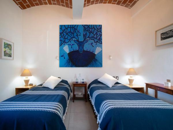 LARIMAR Gallery y Hotel Boutique : photo 1 de la chambre chambre lit king-size standard
