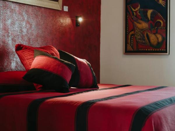 LARIMAR Gallery y Hotel Boutique : photo 9 de la chambre chambre lit king-size supérieure