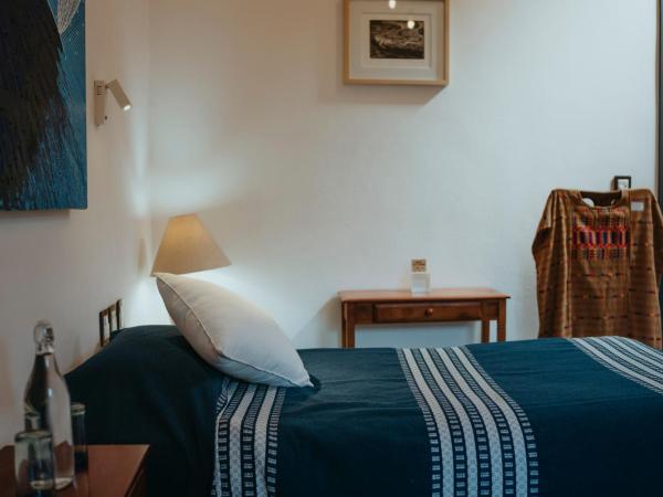 LARIMAR Gallery y Hotel Boutique : photo 5 de la chambre chambre lit king-size standard