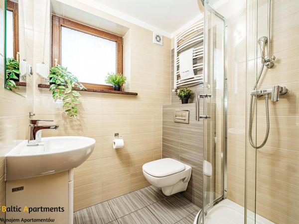 Baltic Apartments - Hotelik Przy Promenadzie : photo 7 de la chambre appartement familial 2 chambres avec terrasse