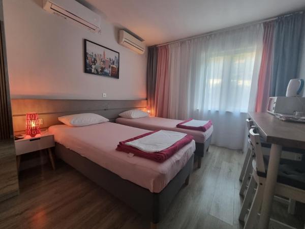 Vukosav Family Apartments and Rooms : photo 6 de la chambre chambre lits jumeaux supérieure