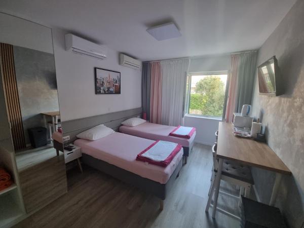 Vukosav Family Apartments and Rooms : photo 7 de la chambre chambre lits jumeaux supérieure