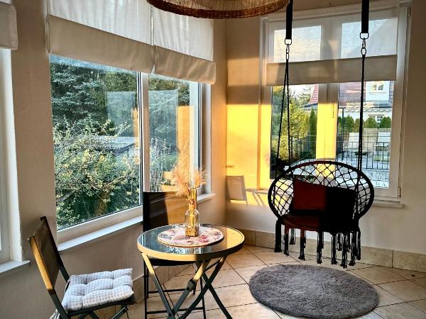 Willa Zacisze - Pokoje Gościnne : photo 3 de la chambre chambre quadruple avec balcon