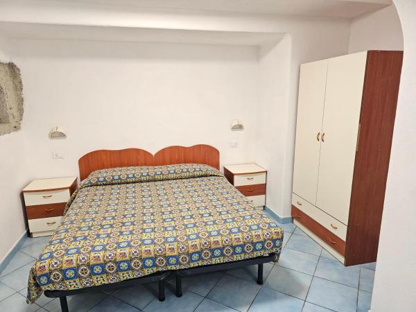 Paco Residence Benessere & Relax : photo 8 de la chambre appartement - vue sur jardin