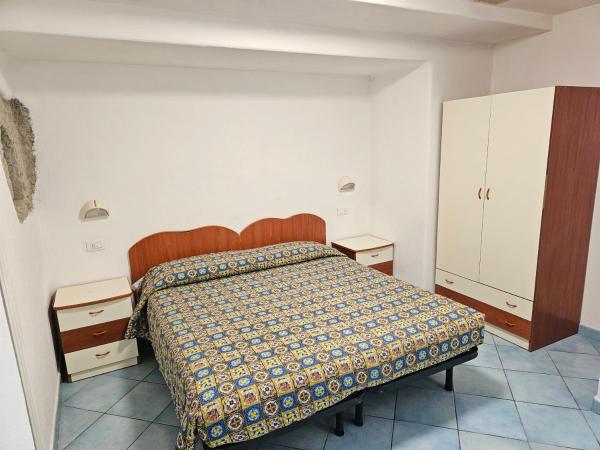 Paco Residence Benessere & Relax : photo 9 de la chambre appartement - vue sur jardin