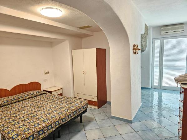 Paco Residence Benessere & Relax : photo 2 de la chambre appartement - vue sur jardin