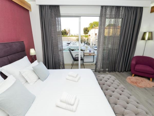 PIAZZA ROOMS Zadar : photo 5 de la chambre chambre lit king-size avec balcon