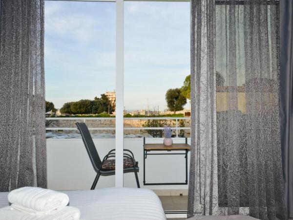 PIAZZA ROOMS Zadar : photo 9 de la chambre chambre lit king-size avec balcon