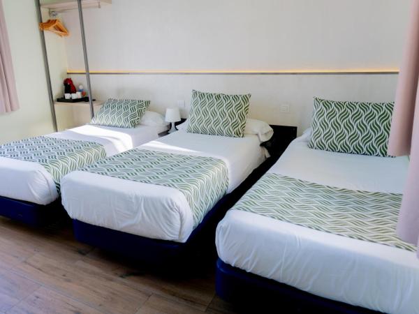 Hostal Charlotte-Gran Vía : photo 2 de la chambre chambre triple Économique