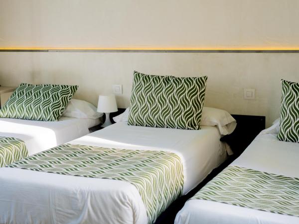 Hostal Charlotte-Gran Vía : photo 4 de la chambre chambre triple Économique