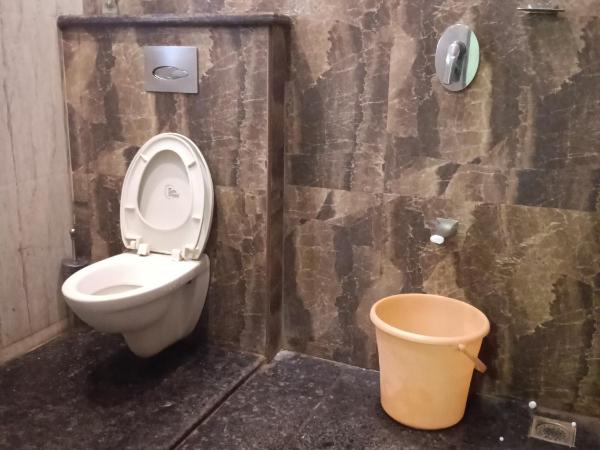 Iris Comfort Inn : photo 5 de la chambre chambre double deluxe (2 adultes + 1 enfant)