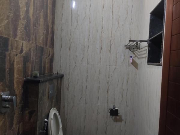 Iris Comfort Inn : photo 6 de la chambre chambre deluxe (2 adultes + 1 enfant)