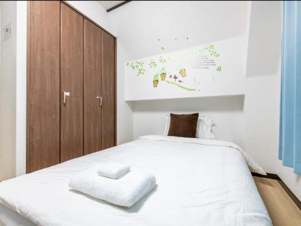 Uhome Tabata Apartment : photo 4 de la chambre appartement 1 chambre