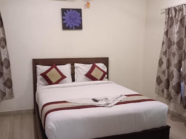 Iris Comfort Inn : photo 4 de la chambre chambre double deluxe (2 adultes + 1 enfant)