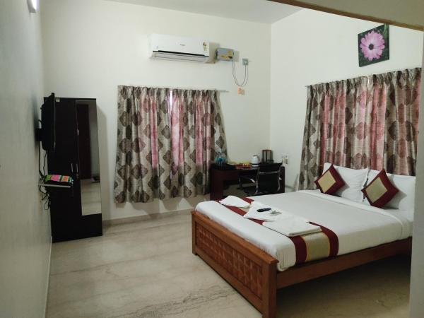 Iris Comfort Inn : photo 2 de la chambre chambre double deluxe