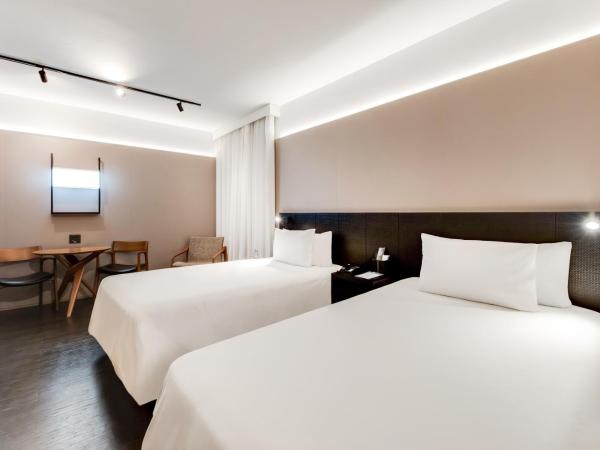 Radisson São Paulo Paulista : photo 2 de la chambre chambre lits jumeaux deluxe