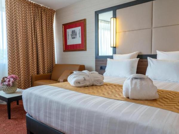 Nash Suites Airport Hotel : photo 1 de la chambre suite triple supérieure 