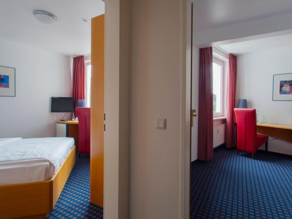 Hotel in Herrenhausen : photo 4 de la chambre chambre double familiale
