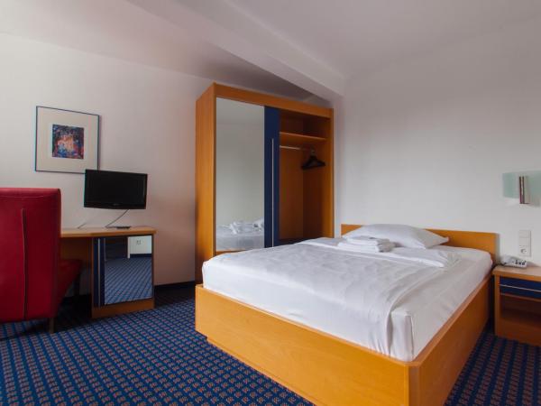 Hotel in Herrenhausen : photo 3 de la chambre chambre double familiale