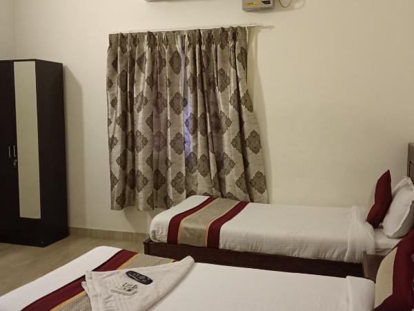 Iris Comfort Inn : photo 3 de la chambre chambre lits jumeaux deluxe