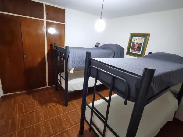 La Casita Hostel : photo 4 de la chambre chambre quadruple Économique avec salle de bains commune