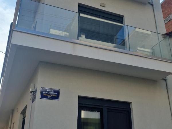 MELIGEO SUITES Center of IOANNINA : photo 7 de la chambre chambre familiale avec salle de bains privative