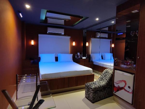 Swing Motel 1 : photo 6 de la chambre suite lit queen-size avec baignoire spa