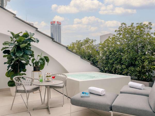 NH Collection Milano CityLife : photo 1 de la chambre suite en duplex avec terrasse