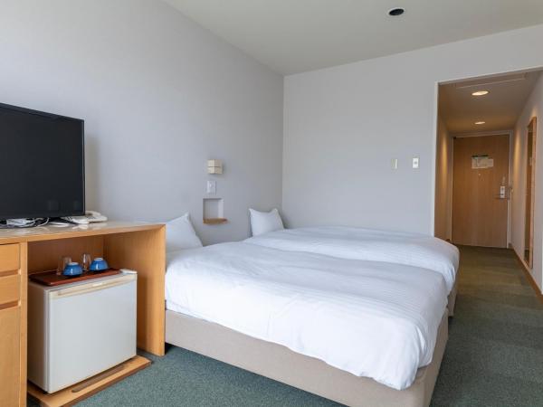 Hotel Lodge Maishima : photo 1 de la chambre chambre lits jumeaux Économique - non-fumeurs