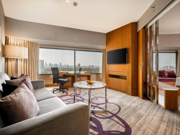 Centara Grand at Central Plaza Ladprao Bangkok : photo 4 de la chambre suite club premium deluxe lit king-size