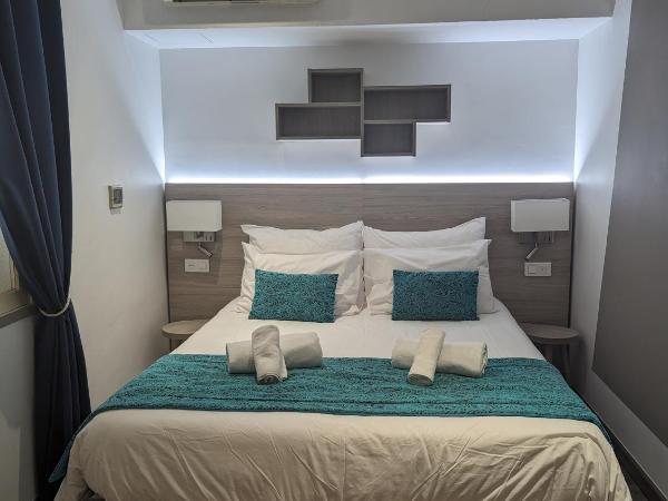 Les Palmiers : photo 2 de la chambre chambre double supérieure - côté nord 