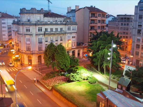 Hostal Mafer : photo 1 de la chambre chambre triple - vue sur ville
