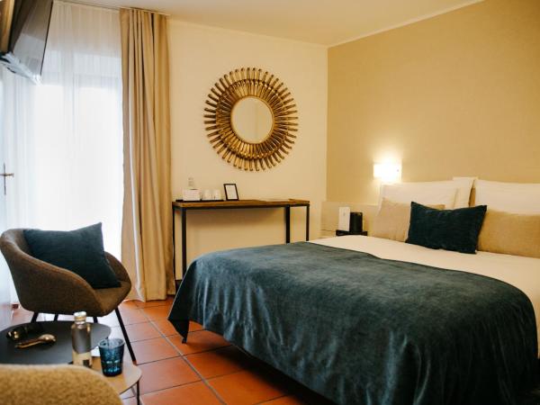 Vista Lakefront Boutique Hotel : photo 6 de la chambre chambre lits jumeaux premium avec balcon - vue sur lac