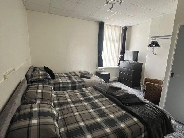 Tudor Rose Hotel : photo 1 de la chambre chambre quadruple standard