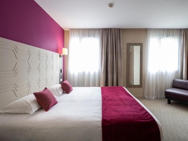 Kyriad Prestige Saint-Malo : photo 1 de la chambre chambre triple avec 1 lit double et 1 lit simple