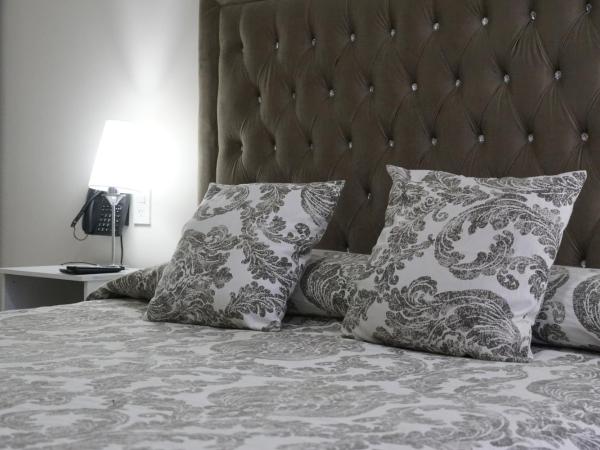 Hotel Howard Johnson Rosario : photo 3 de la chambre appartement