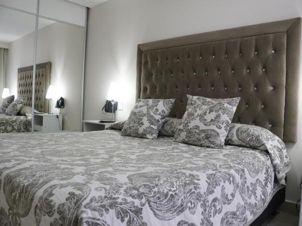 Hotel Howard Johnson Rosario : photo 2 de la chambre appartement