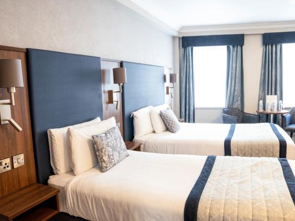 The Western Hotel : photo 1 de la chambre chambre quadruple