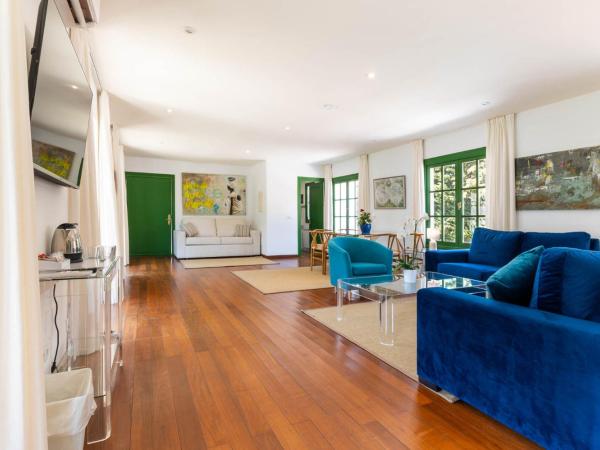 The Touch Club : photo 10 de la chambre chambre quadruple - vue sur jardin