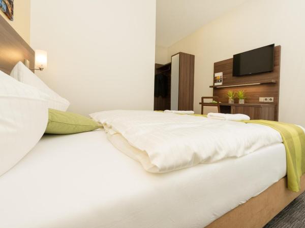 Goethe Conference Hotel by Trip Inn : photo 3 de la chambre chambre quadruple