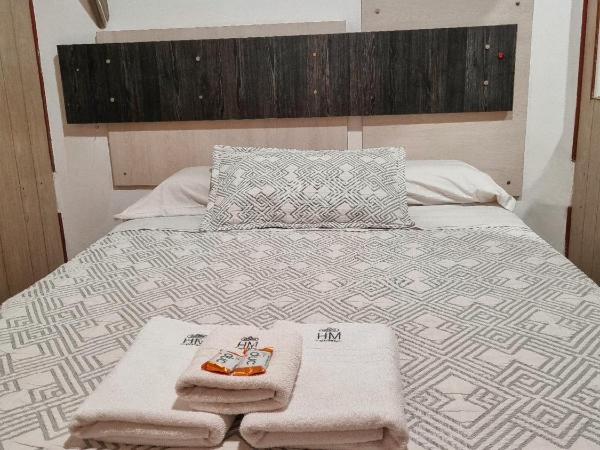 HOTEL HM : photo 1 de la chambre chambre triple avec salle de bains privative