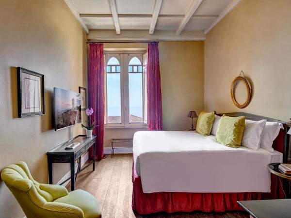 Palazzo Vecchio Taormina : photo 1 de la chambre chambre lit king-size supérieure