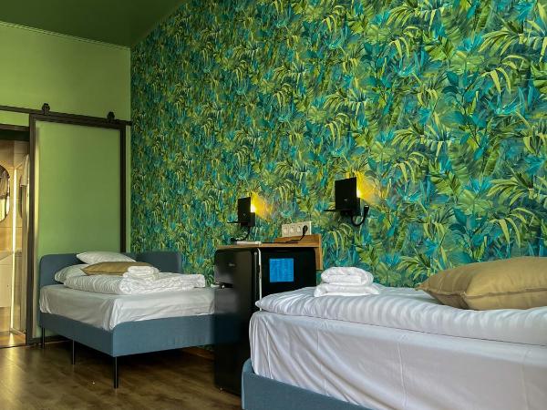 Boutique Hotel & Event Center : photo 1 de la chambre chambre lits jumeaux standard