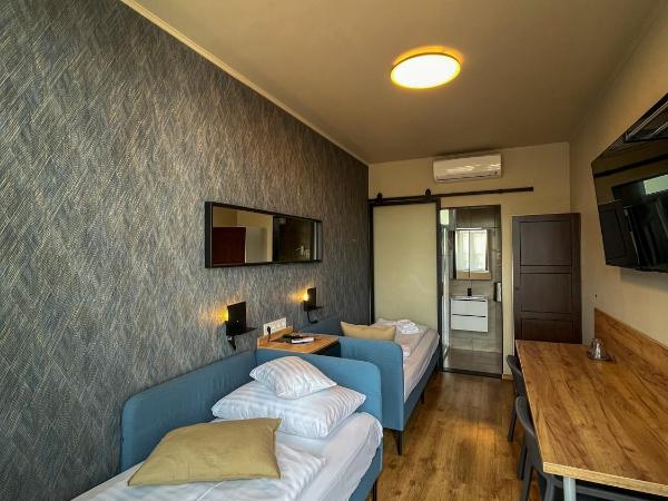 Boutique Hotel & Event Center : photo 4 de la chambre chambre lits jumeaux standard