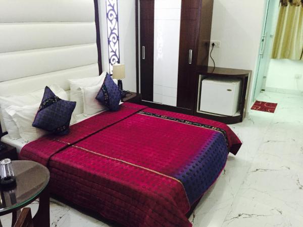 Hotel Sun International : photo 1 de la chambre chambre double deluxe (2 adultes + 1 enfant)